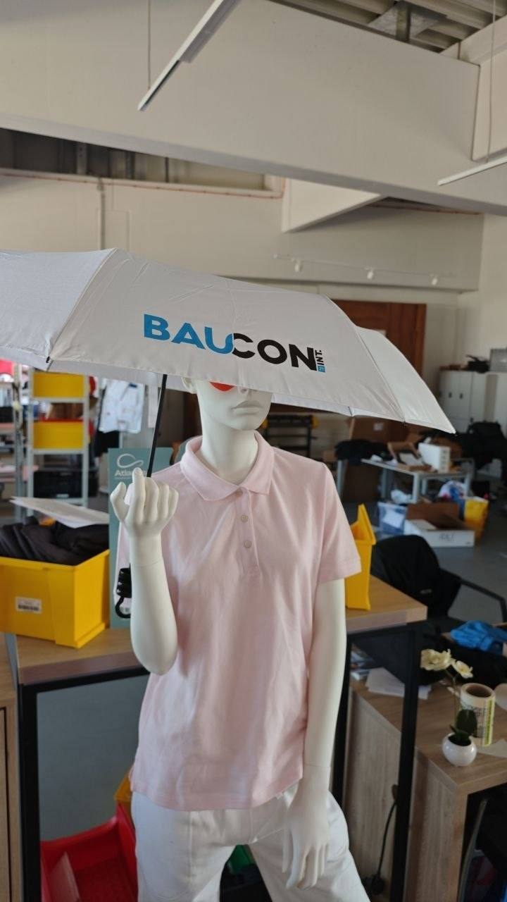 Regenschirm bedruckt mit Baucon Firmenlogo, Werbeartikel Wien