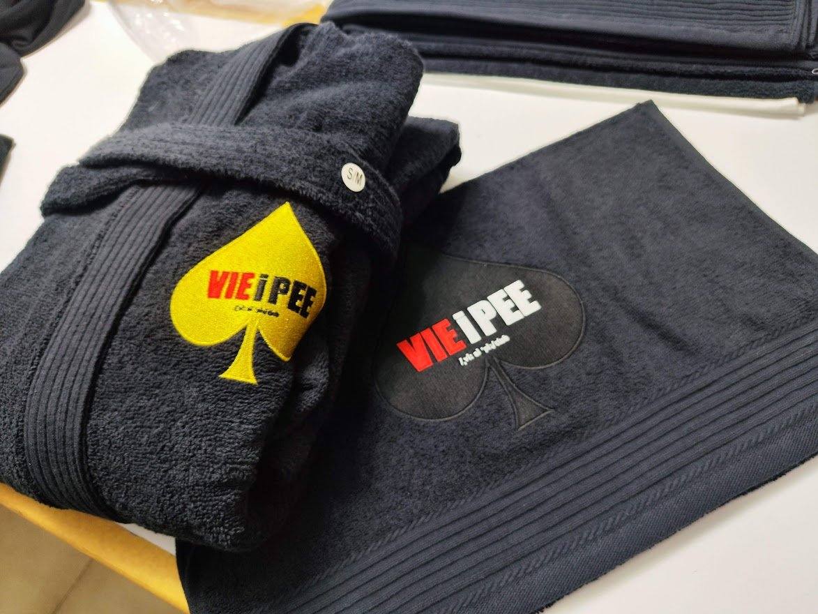 Embroidered bathrobe and towel with VIEiPEE logo, terry embroidery by STICKDRUCK22 Vienna