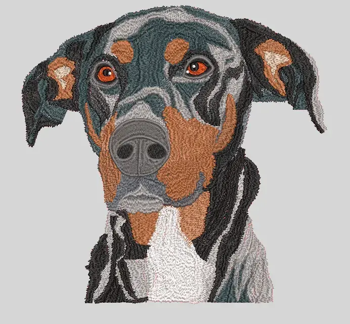 Hundeportrait als detailreiche Stickerei